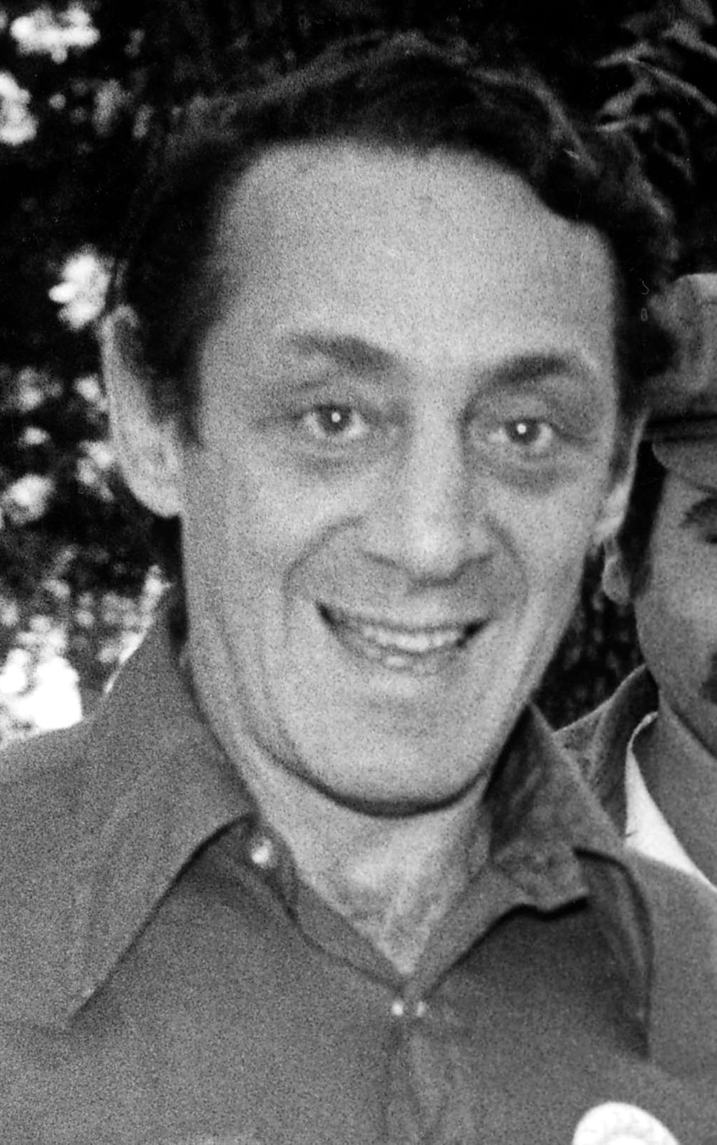 Harvey Milk at a caPride event; early openly gay elected official and union ally.