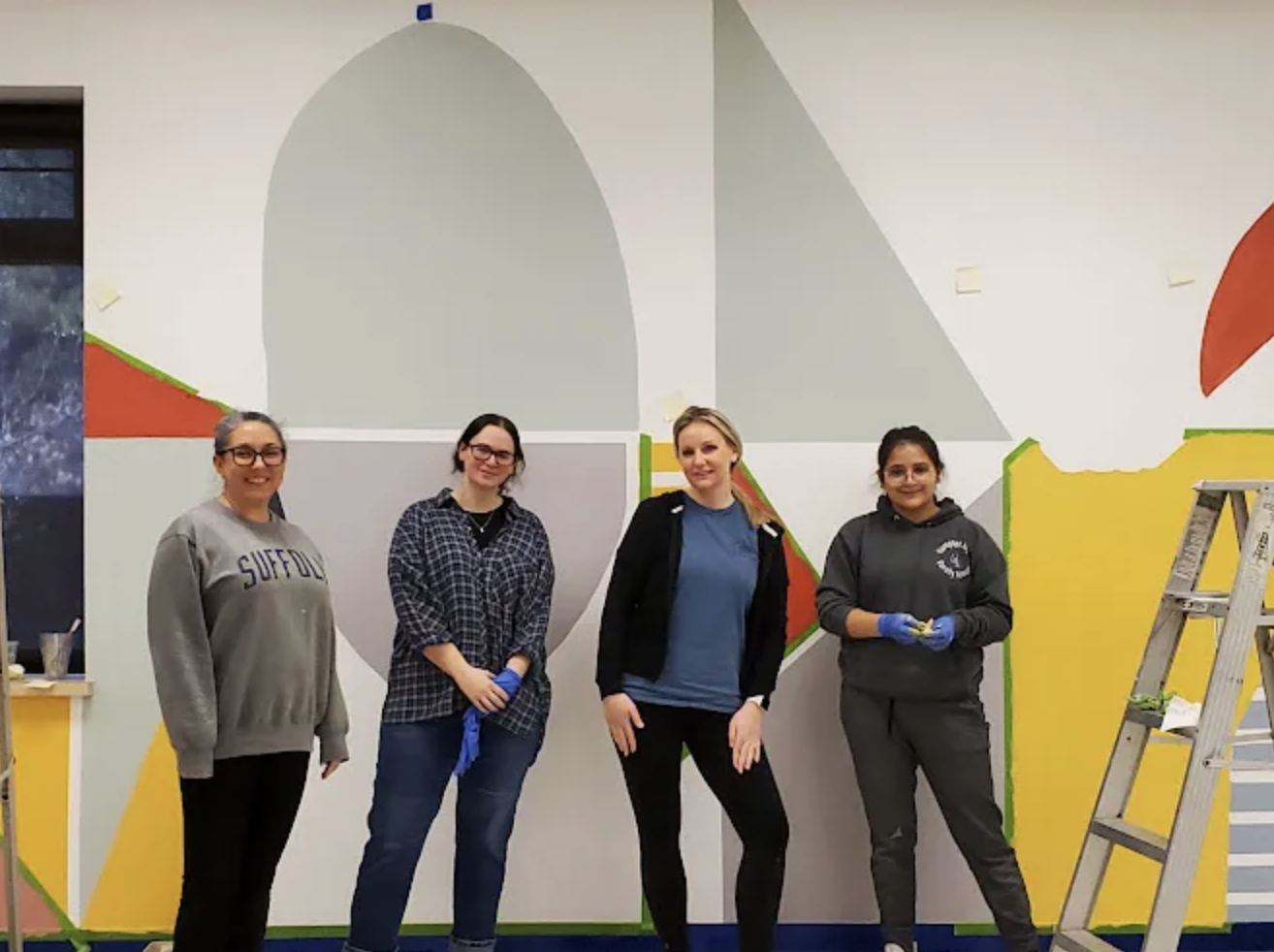 From left, Eileen McGilly, Emily Cordaro, Jessica Boyle and Joseline Quito beautifying the shelter.