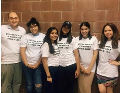 feminist club members at an in person meeting