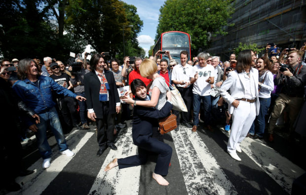 Musical education and inspiration with fans recreating the Beatles' famed moment at Abbey Road
