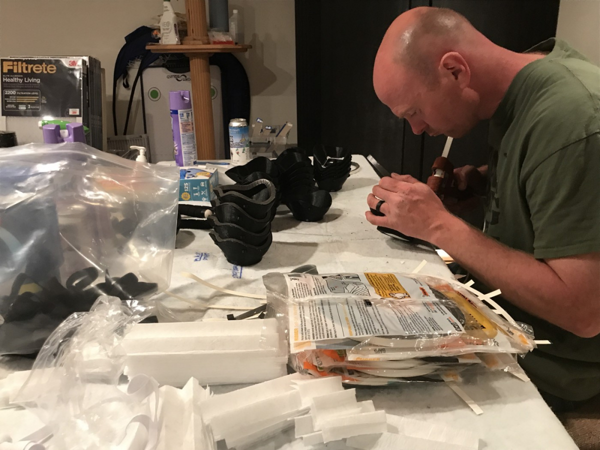 nashua aft member assembles masks